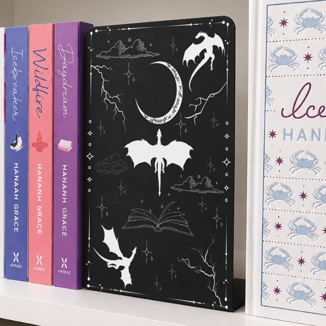     Fantasy Dragons Metal Bookshelf Bookends with laser engraved dragon and celestial design displayed between books on a shelf