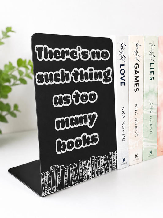     There Is No Such Thing As Too Many Books Metal Bookshelf Sign Bookend shown at an angle with decorative book illustrations and novels.