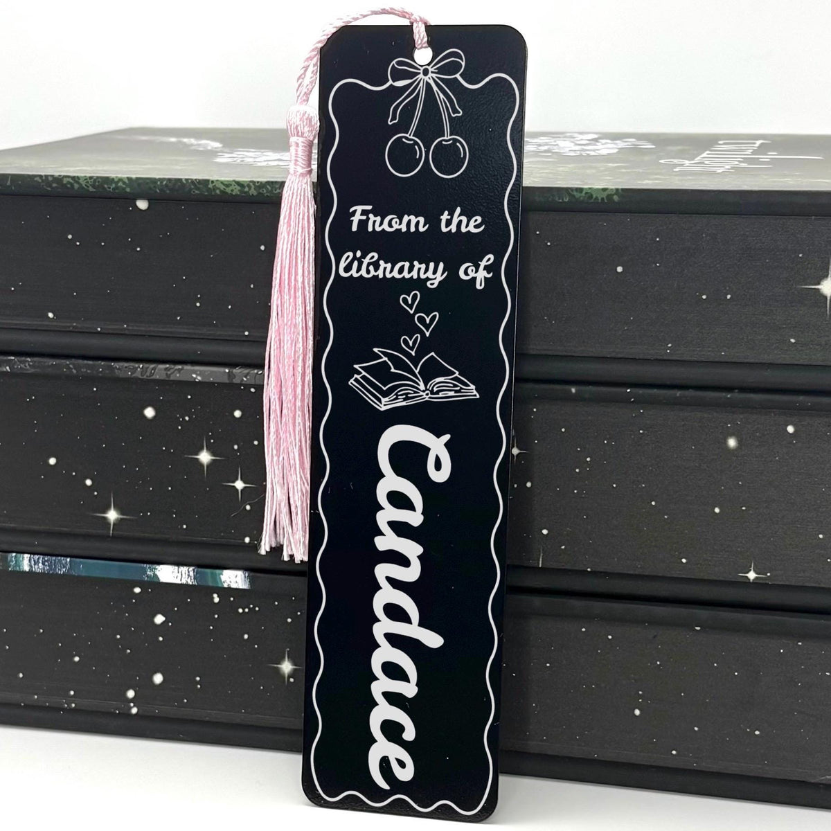     Personalised Name Cherries Metal Bookmark in black with pink tassel and custom library name engraving