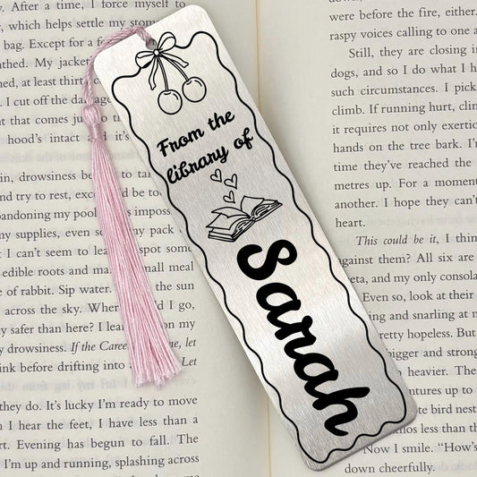     Brushed silver Personalised Name Cherries Metal Bookmark with custom name and pink tassel on an open book