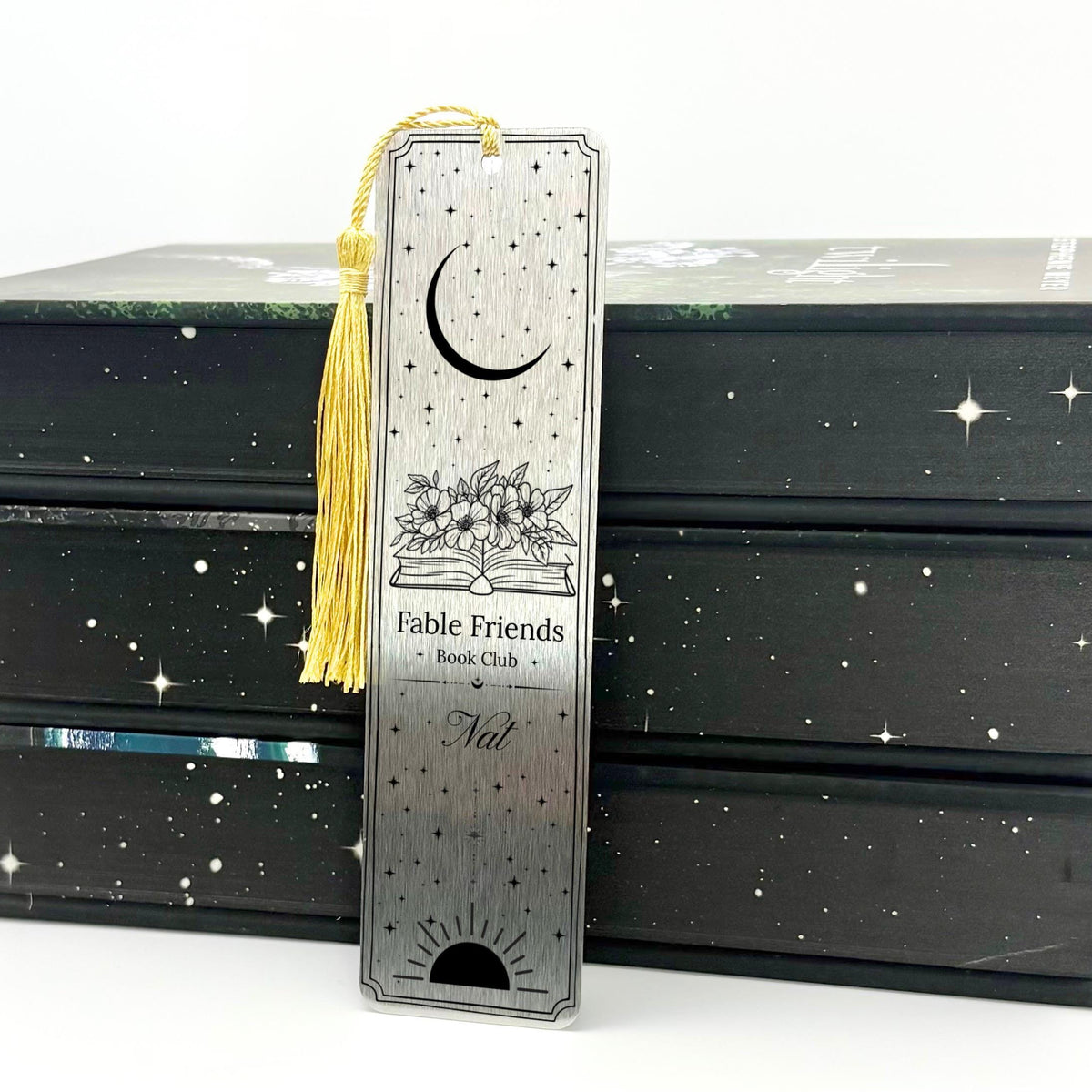     Personalised Bookclub Metal Bookmark in brushed silver with custom book club and member name, celestial floral design and gold tassel