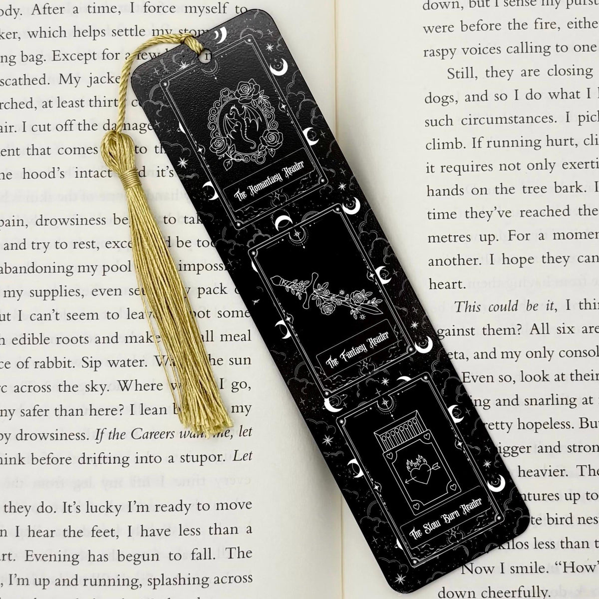 Fantasy Romantasy Slow Burn Metal Bookmark on an open book with a gold tassel