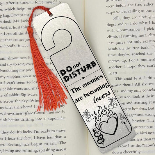     Enemies to Lovers Dark Romance Bookmark in brushed silver metal with engraved romance design and red tassel