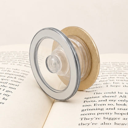     Back view of Read All The Time DNF Occasionally Metal MagSafe Kindle Grip showing the clear expandable grip and magnetic base