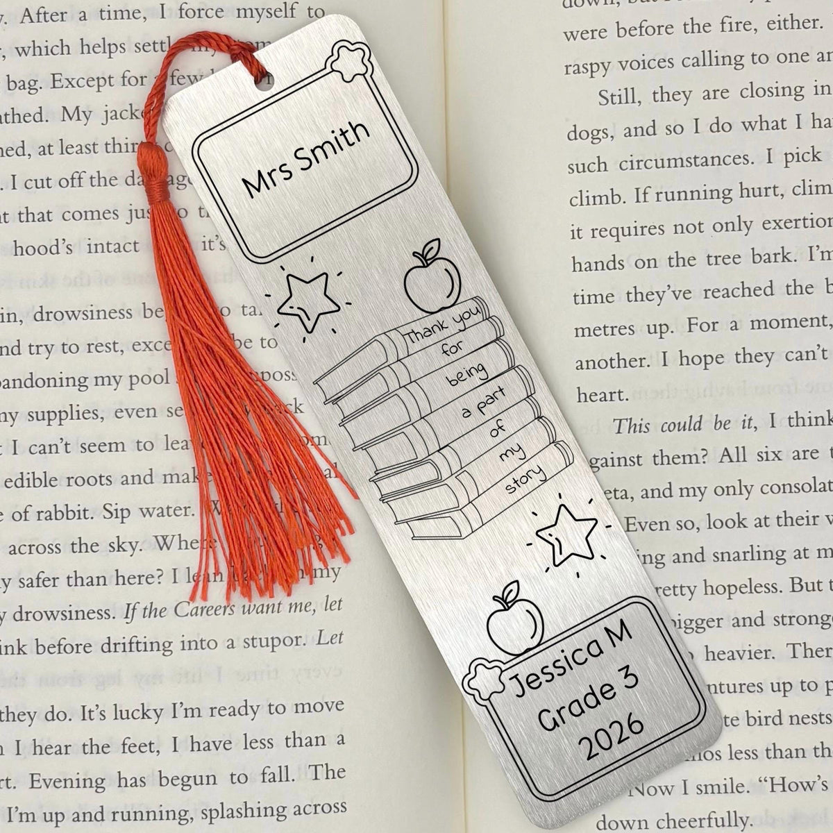    Silver Personalised Teacher Gift Metal Bookmark with custom teacher and student details displayed on an open book