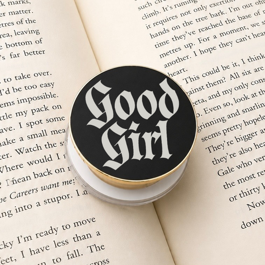     Good Girl Metal MagSafe Kindle Grip featuring gothic lettering displayed on an open book