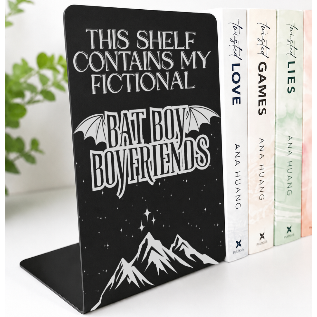 Bat Boys Metal Bookshelf Sign Bookend featuring an engraved fictional bat boy boyfriends design supporting romance and fantasy books on a white shelf.