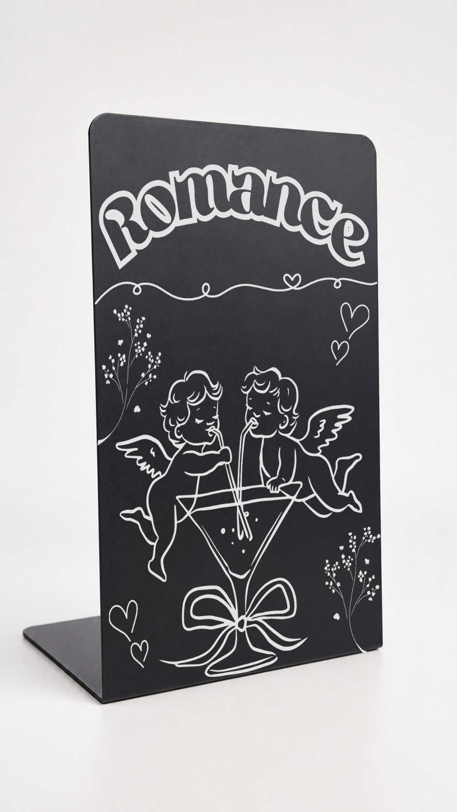     Close-up of Romance Genre Metal Bookshelf Sign Bookend with cupid, hearts and floral details