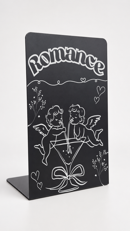     Close-up of Romance Genre Metal Bookshelf Sign Bookend with cupid, hearts and floral details