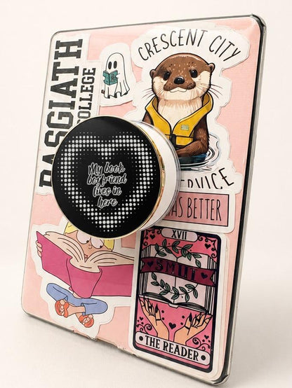     Book Boyfriend Metal Kindle Grip attached to a decorated Kindle with black heart design