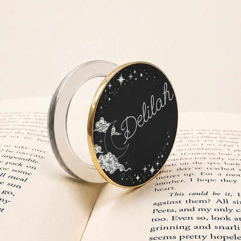     Personalised Name Celestial Metal Kindle Grip featuring custom name Delilah with moon and star design