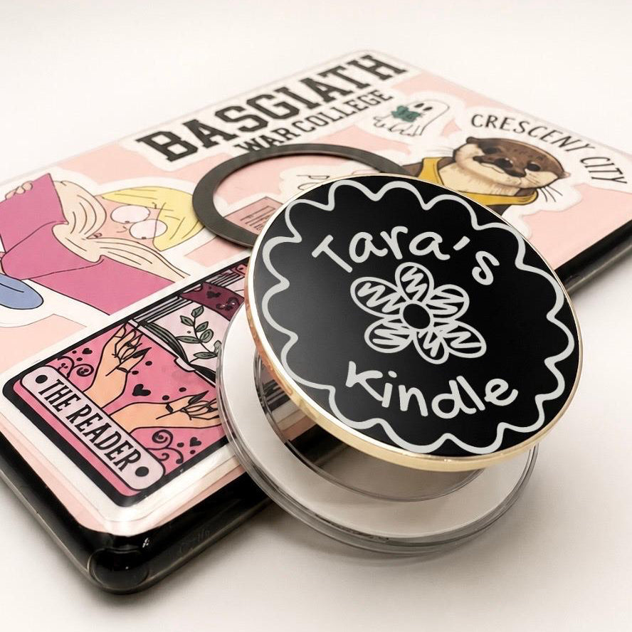 Personalised Name Floral Metal E-Reader Grip with custom name design on Kindle holder.