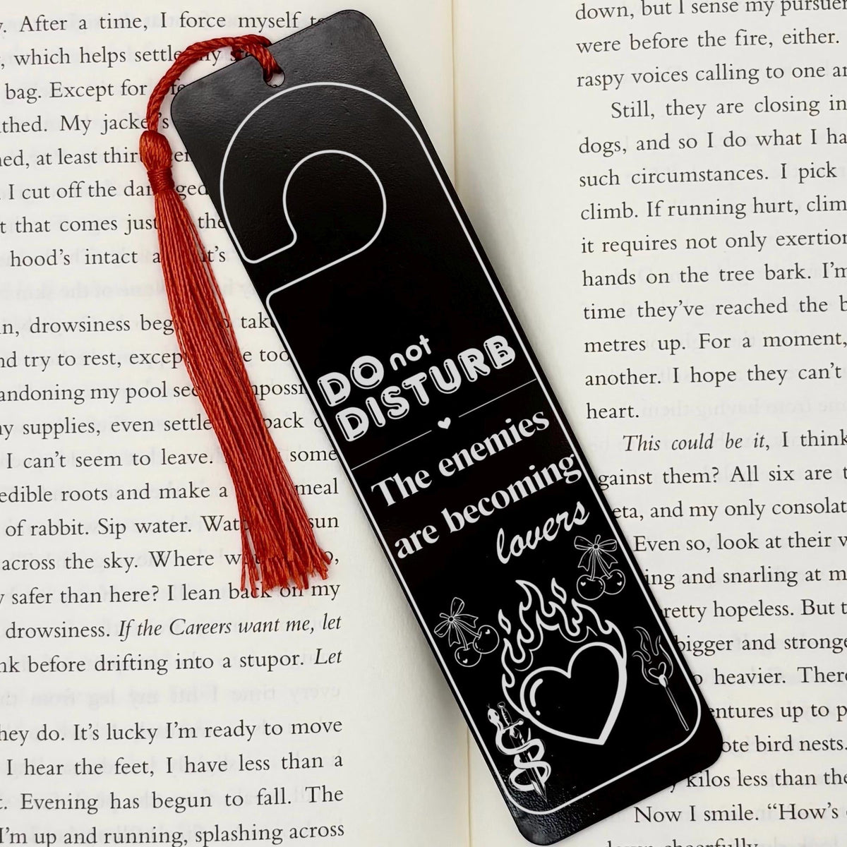     Enemies to Lovers Dark Romance Bookmark in black metal with Do Not Disturb design, flaming heart and red tassel