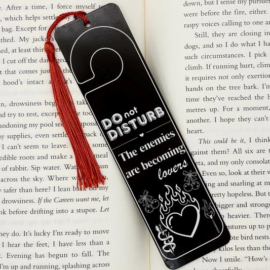     Enemies to Lovers Dark Romance Bookmark in black metal with Do Not Disturb design, flaming heart and red tassel
