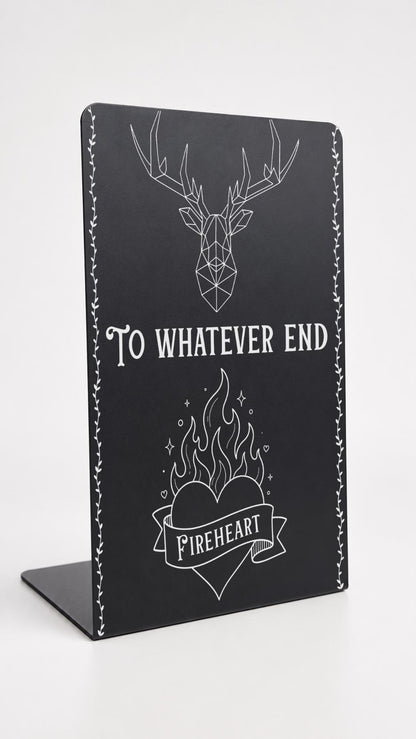     To Whatever End Metal Bookshelf Bookends in black with geometric stag, flaming heart and Fireheart design